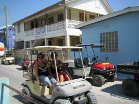 San Pedro Ambergris Caye golf cart in the street – Best Places In The World To Retire – International Living